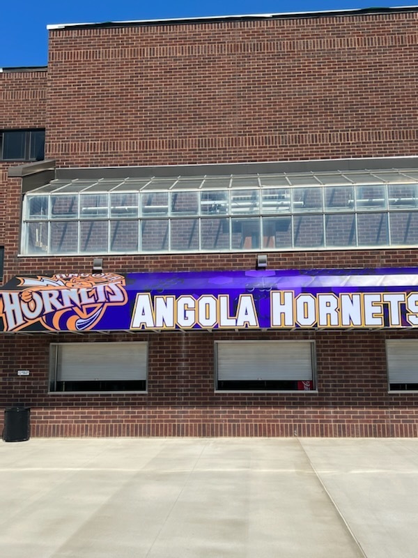 concession stand with purple and gold awning